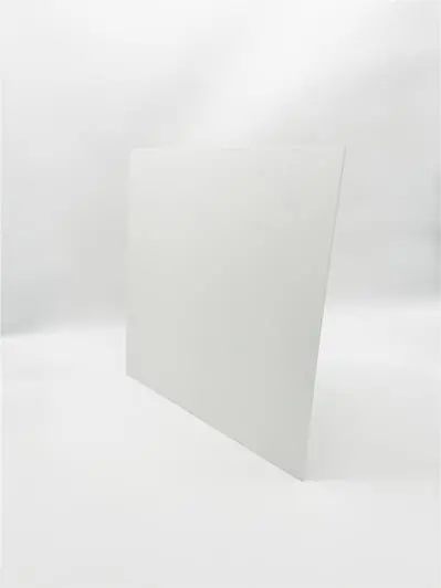 A plain white rectangular sheet stands upright, resembling blank warehouse aisle signs.