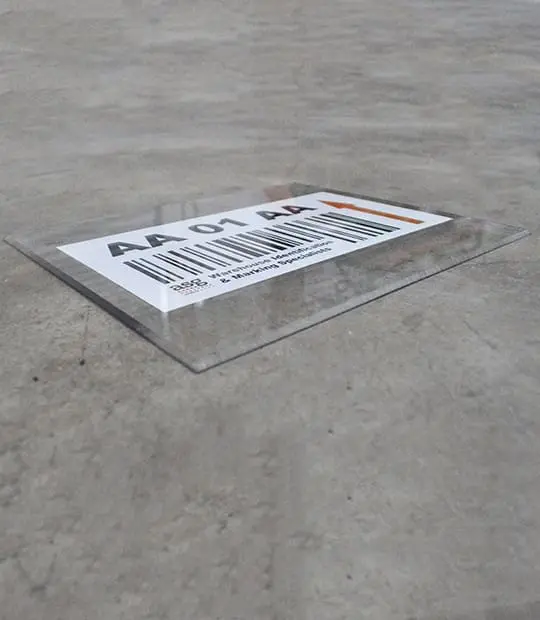 A floor label lies on the ground.